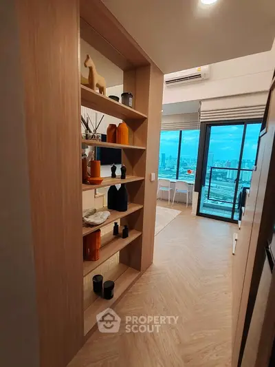 Modern apartment with stylish decor and stunning city view from balcony
