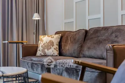 Elegant living room with plush brown sofa and stylish decor