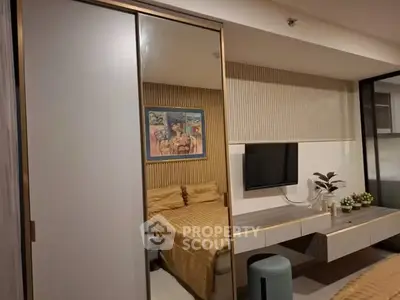 Modern bedroom with stylish decor and built-in wardrobe