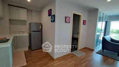 Modern apartment interior with kitchen and balcony view