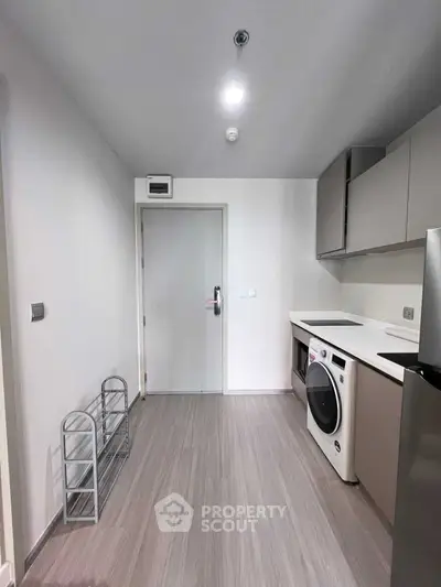 Modern kitchen with sleek appliances and minimalist design