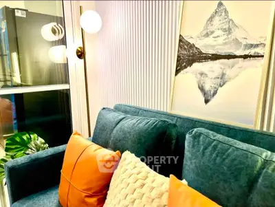 Stylish living room with modern decor and mountain artwork