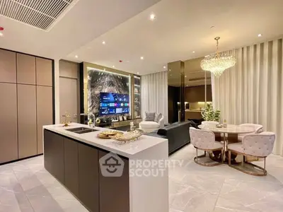 Luxurious open-plan living room with modern kitchen and elegant dining area