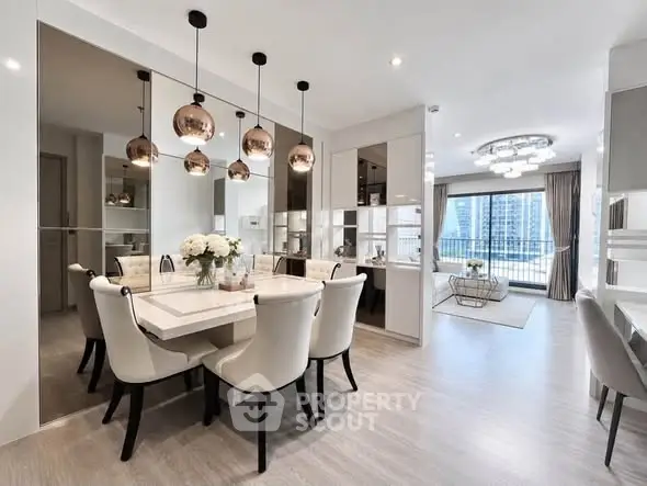 Luxurious open-plan dining and living area with modern decor and city view.