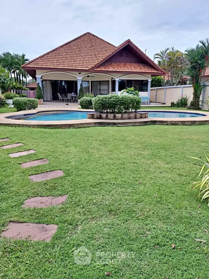 Charming villa with private pool and lush garden, perfect for tranquil living.
