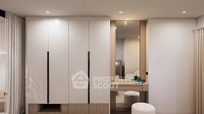 Modern bedroom with sleek wardrobe and stylish vanity area, perfect for contemporary living.