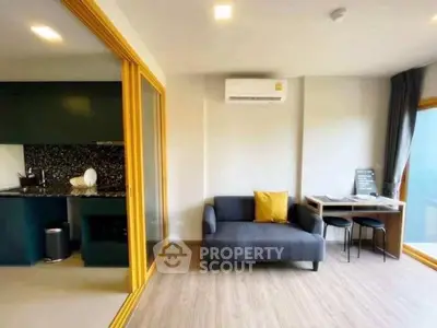 Modern living room with open kitchen and stylish decor