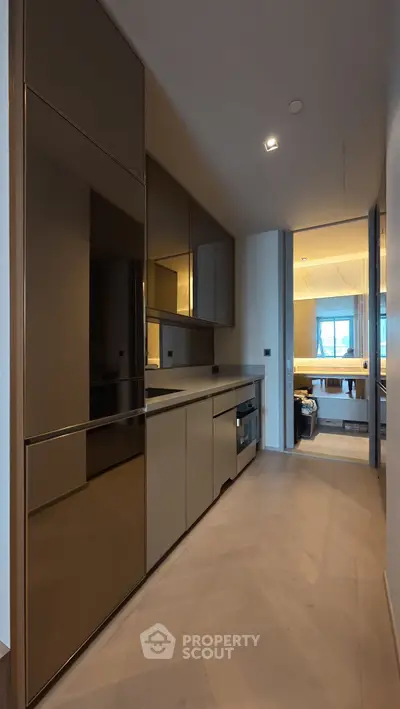Modern kitchen with sleek cabinetry and open layout design