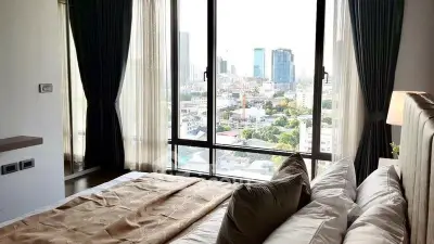Luxurious bedroom with stunning city view and elegant decor