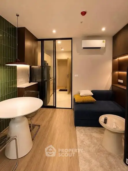 Modern living room with stylish furniture and open layout in a contemporary apartment.