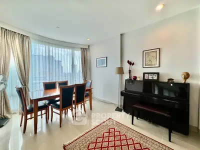 Elegant living room with piano and dining area, featuring large windows and stylish decor.