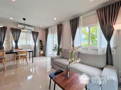 Modern living room with elegant decor and natural light