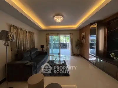 Luxurious living room with elegant lighting and modern decor