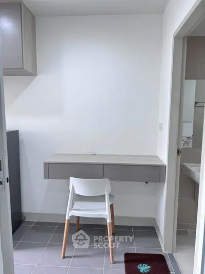 Modern minimalist study nook with sleek desk and chair in compact space