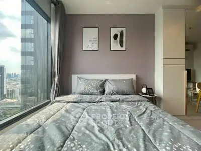 Modern bedroom with city view and stylish decor in high-rise apartment