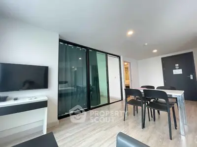 Modern living room with dining area and sleek decor