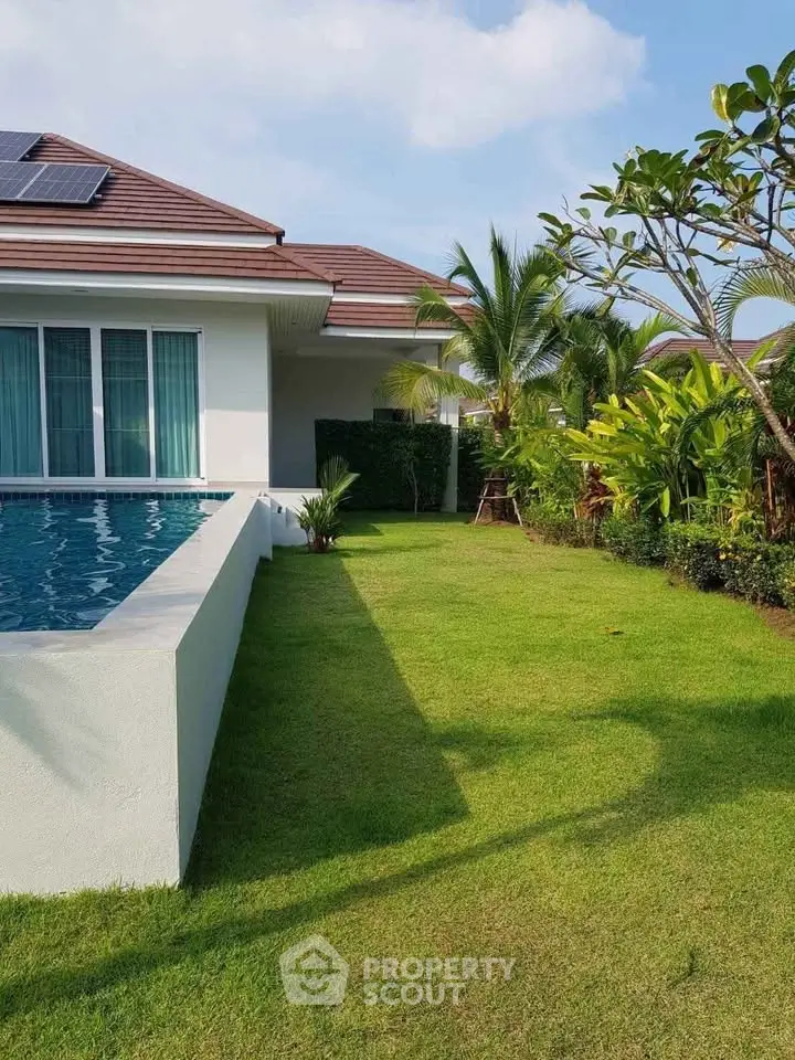 Luxurious villa with private pool and lush garden, perfect for serene living.