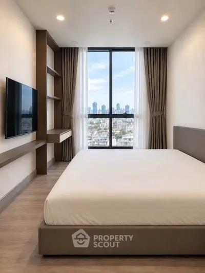 Modern bedroom with city view, large window, and sleek furnishings in a high-rise apartment.