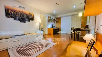 Spacious living room with wooden flooring and modern decor