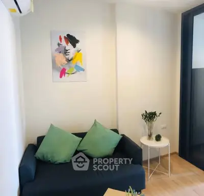 Cozy living room with modern art and comfortable seating