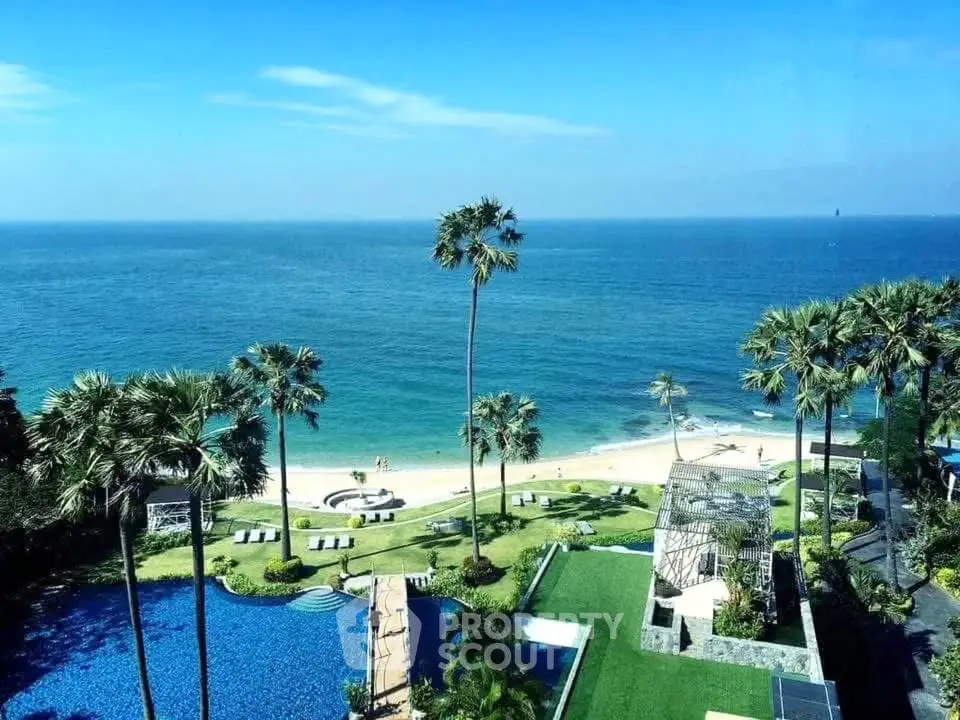 Stunning beachfront property with pool and lush gardens offering breathtaking ocean views.