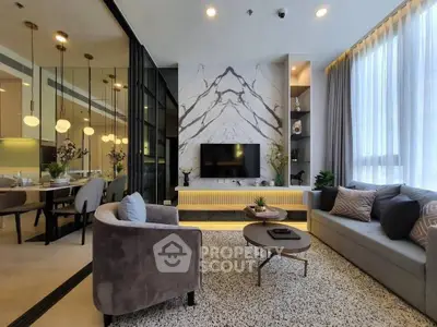 Luxurious modern living room with elegant decor and large windows