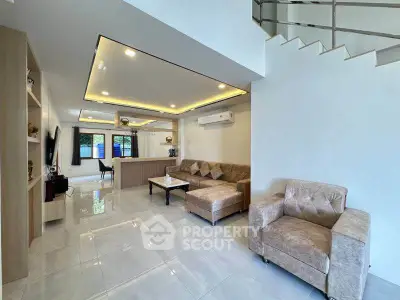 Spacious modern living room with elegant furniture and open layout