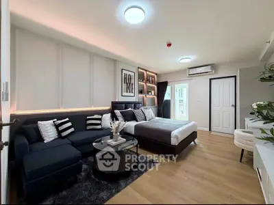 Modern studio apartment with stylish decor and cozy living area