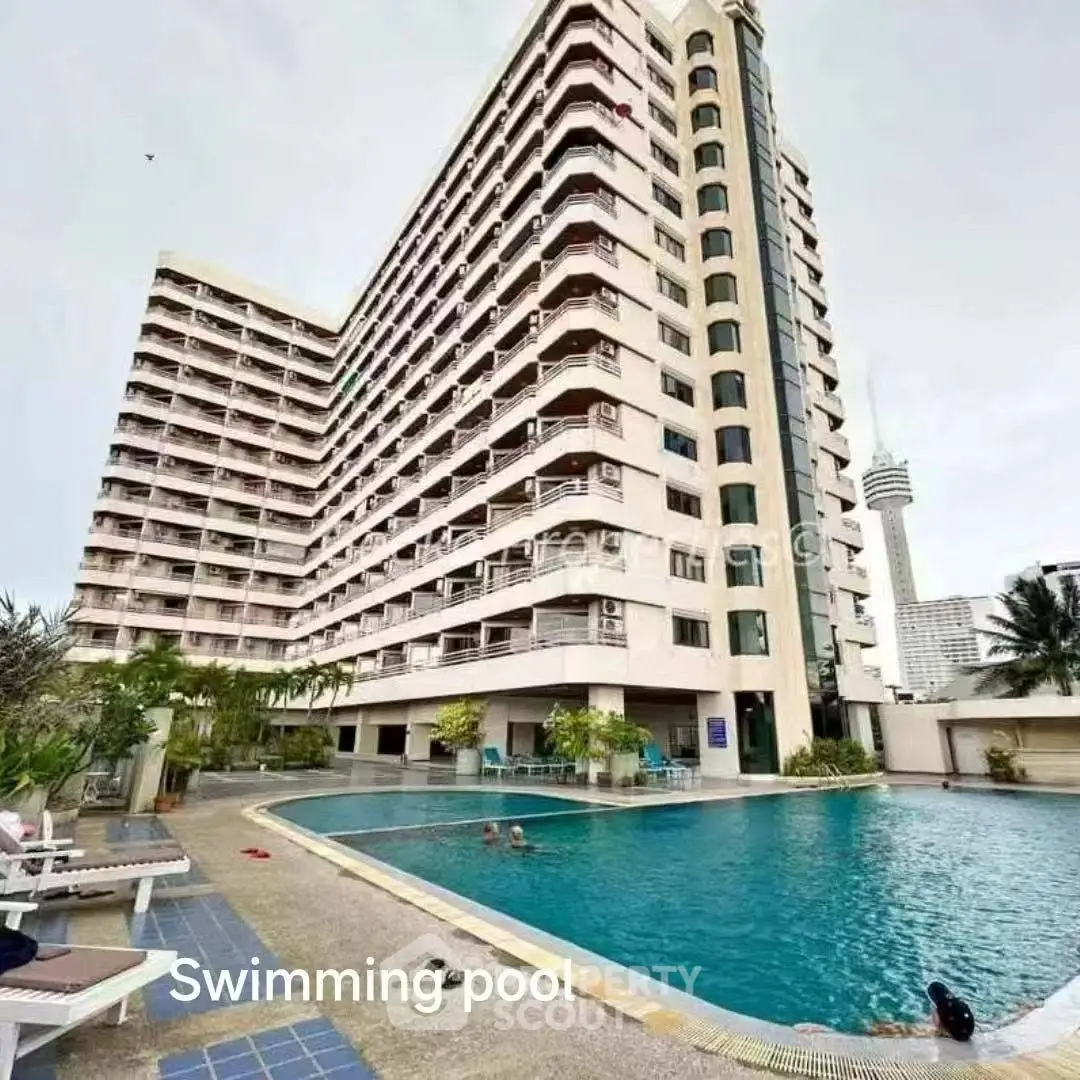 Spacious condominium with pool and city view, perfect for urban living.
