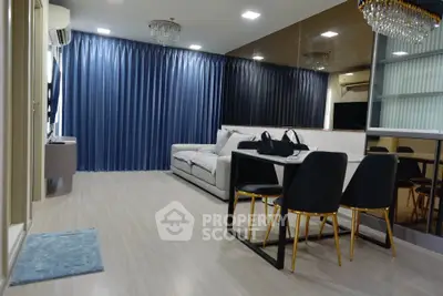 Modern living room with elegant dining area and luxurious decor