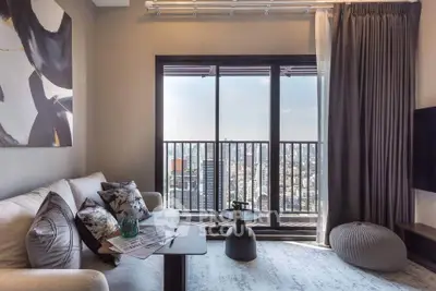 Modern living room with stunning city view and stylish decor