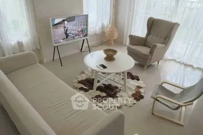 Elegant living room with modern furniture and natural light