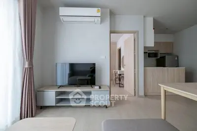 Modern living room with air conditioning and sleek furniture in a stylish apartment.