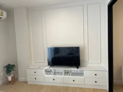 Modern living room with sleek TV stand and minimalist decor