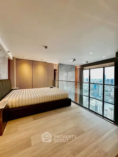 Luxurious bedroom with panoramic city view and modern design
