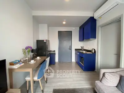 Modern apartment interior with stylish kitchen and cozy living area, perfect for urban living.