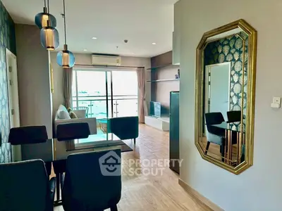 Modern living room with elegant decor and balcony view