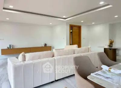 Spacious modern living room with elegant furniture and stylish decor