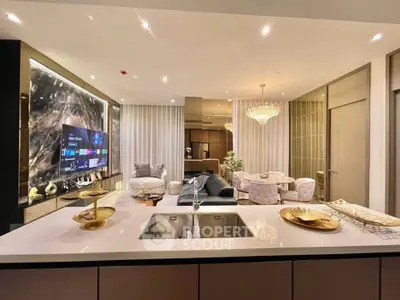 Luxurious open-plan living room with modern decor and elegant lighting