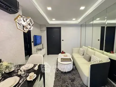 Modern living room with elegant decor and stylish lighting in a cozy apartment.