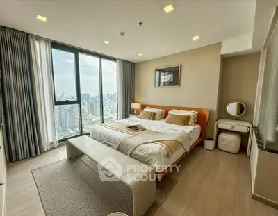 Luxurious bedroom with stunning city view and modern decor