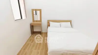 Cozy minimalist bedroom with wooden flooring and natural light