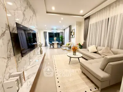 Luxurious modern living room with marble accents and elegant decor