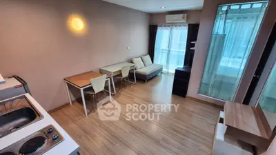 Modern living room with open kitchen and stylish decor