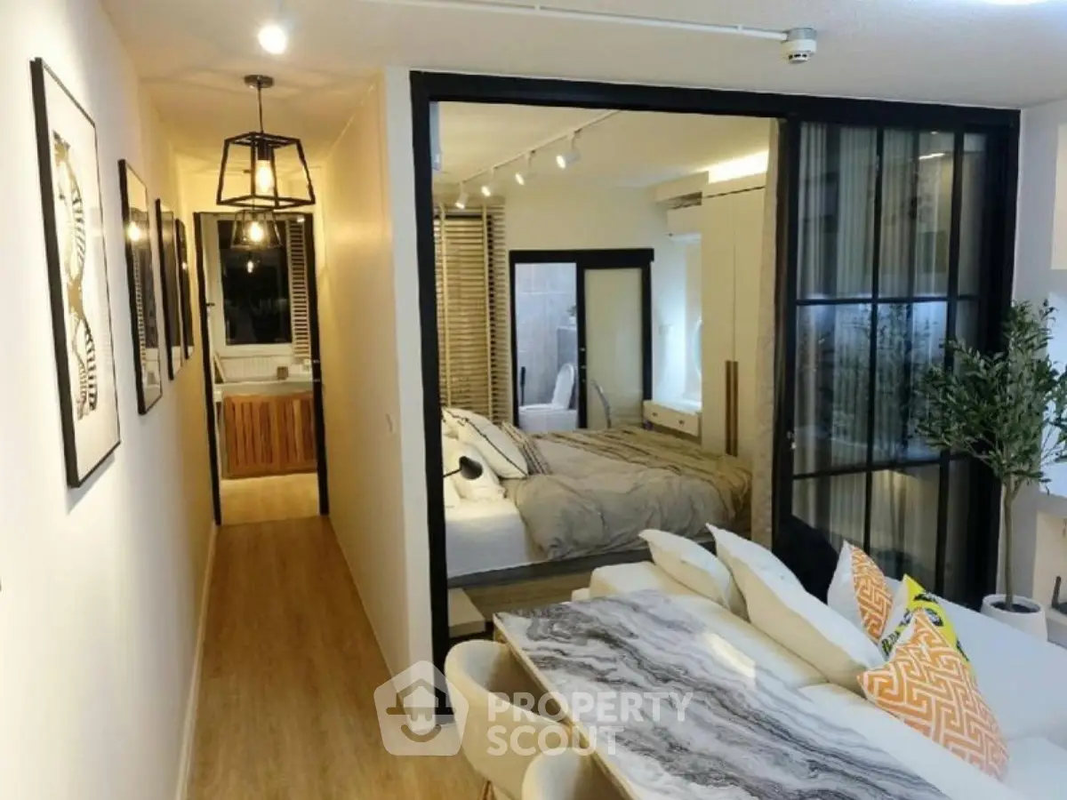 Modern apartment interior with stylish dining area and cozy bedroom