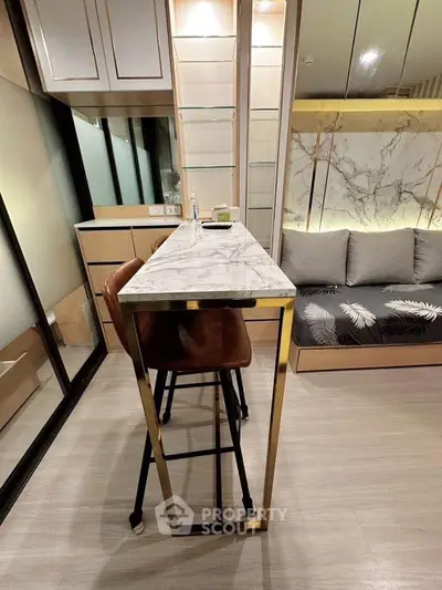 Modern living room with elegant marble table and stylish decor