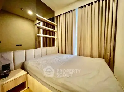 Cozy bedroom with modern design and ample natural light