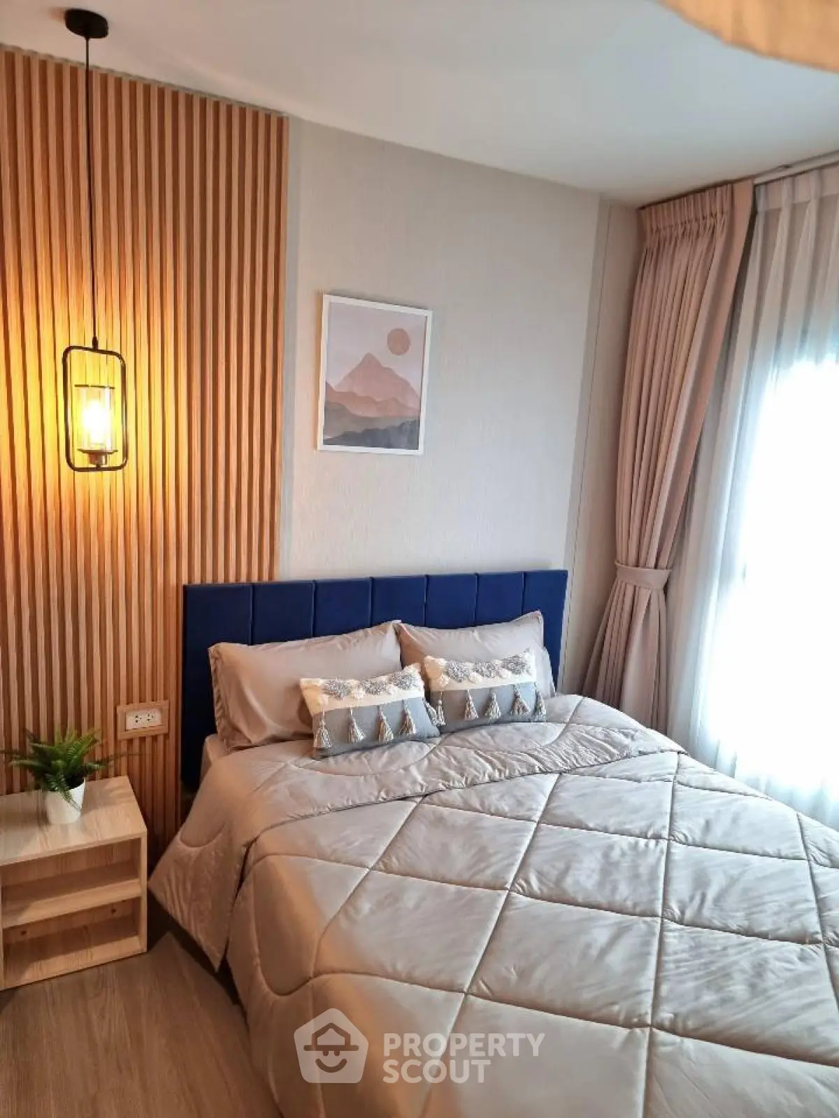 Cozy bedroom with modern decor and natural light