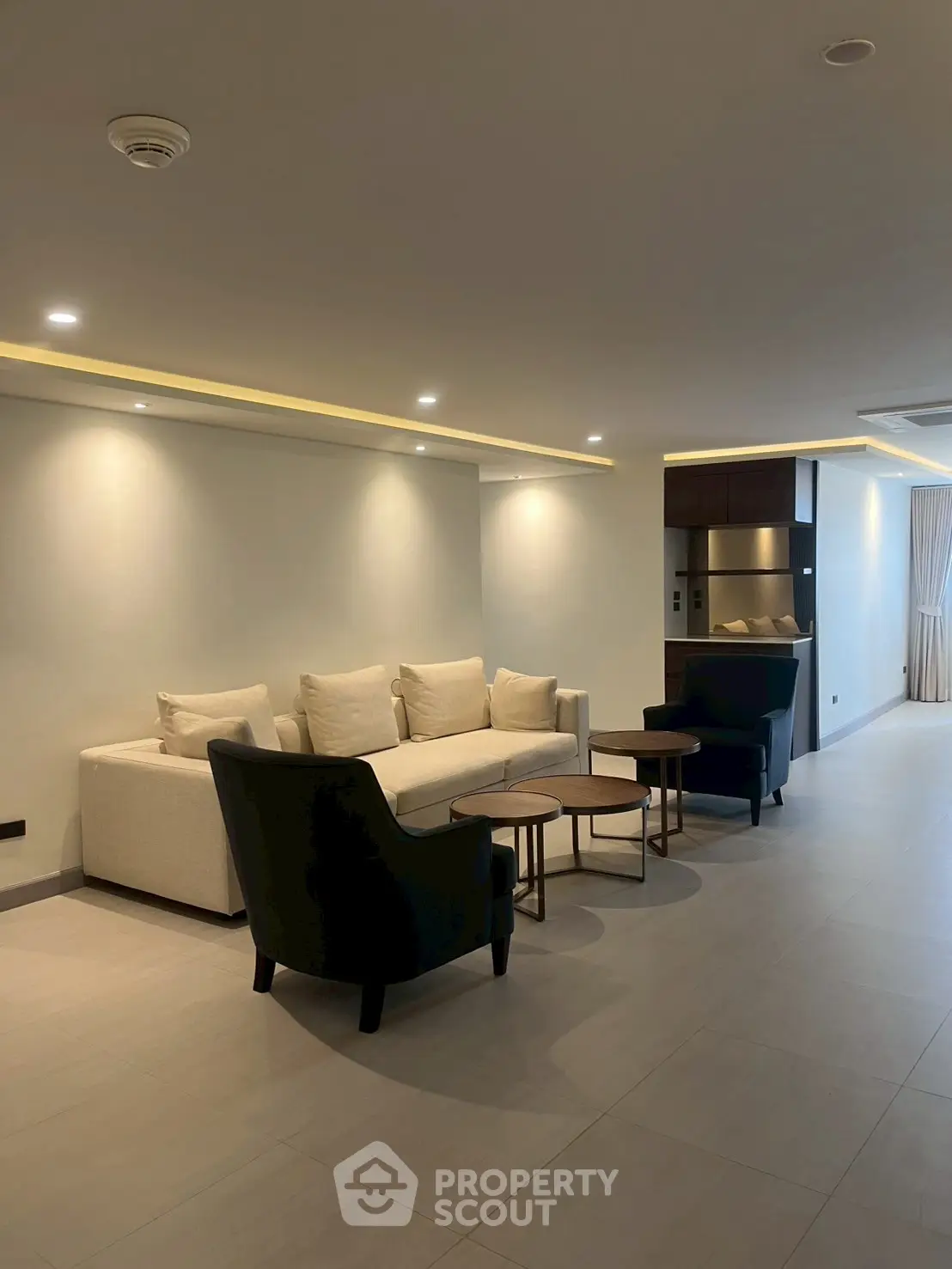 Spacious modern living room with elegant furniture and open layout