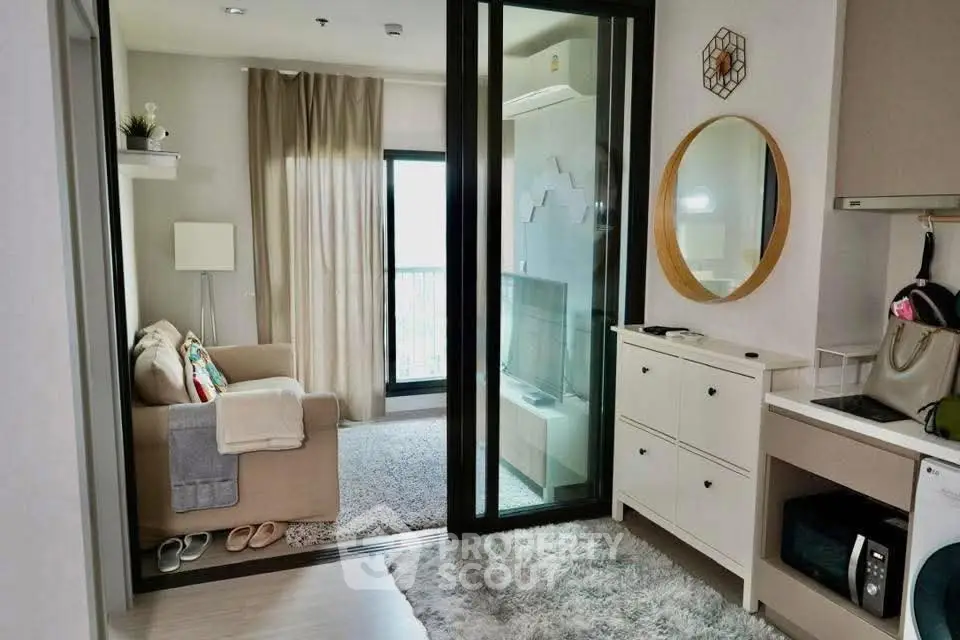 Cozy modern living room with balcony view and stylish decor